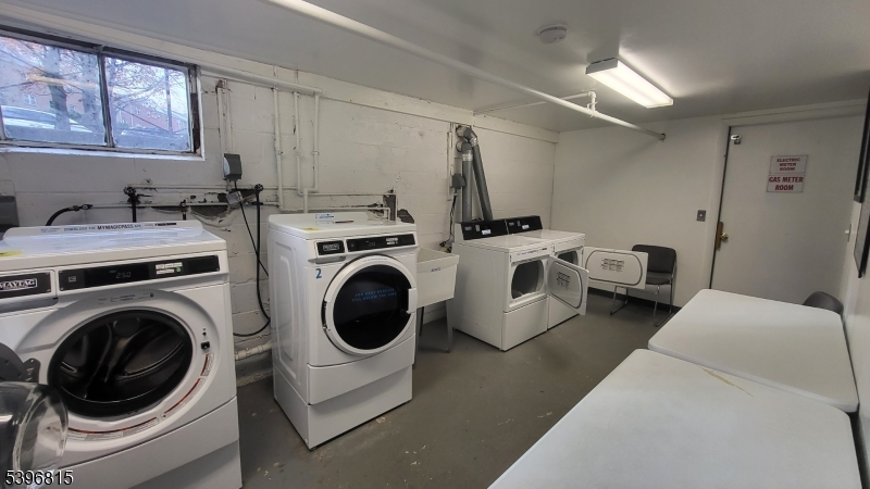 2467 Highway 10, Unit 8B Morris Plains, NJ 07950 - Photo 15 of 15 a view of a room that has washer and dryer