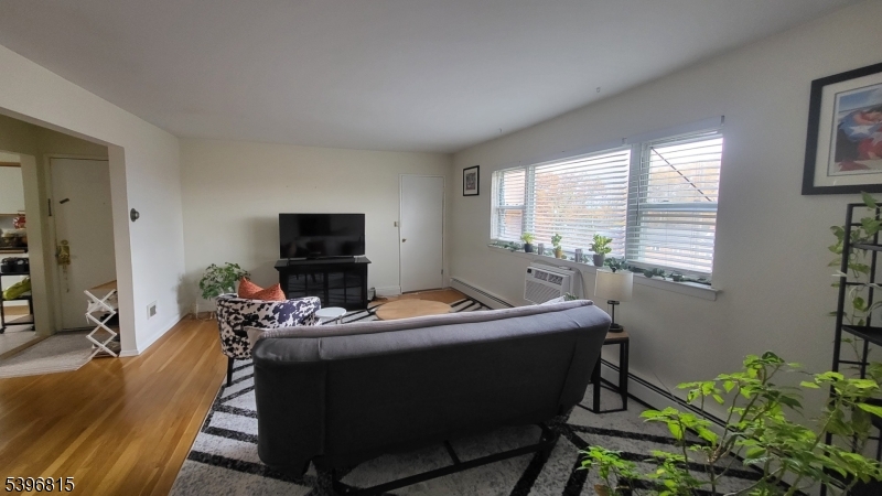 2467 Highway 10, Unit 8B Morris Plains, NJ 07950 - Photo 7 of 15 a room with furniture and window