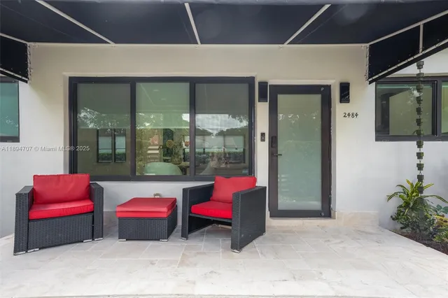 a lobby with furniture and garden