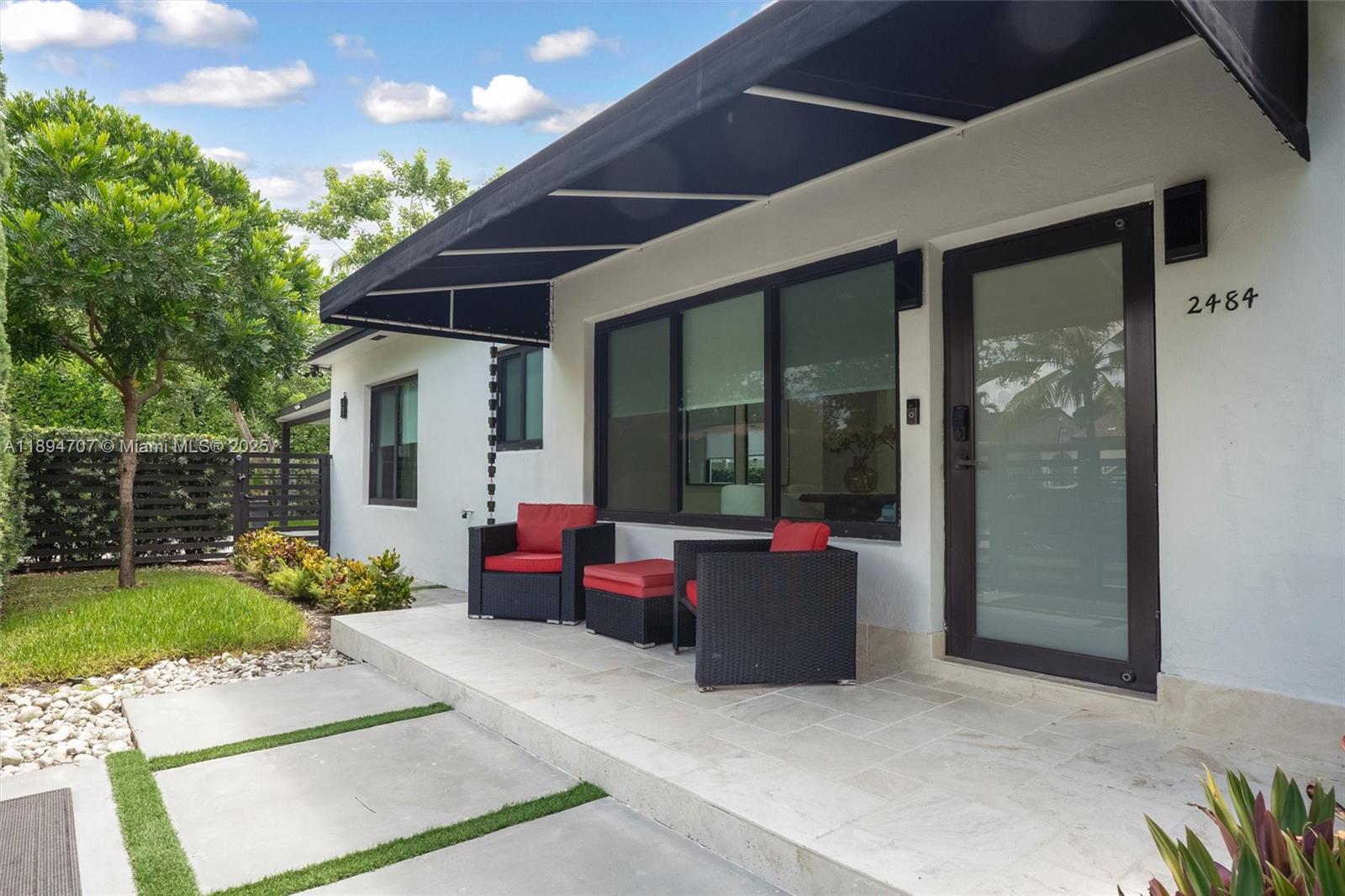 2484 Southwest 25th Street Miami, FL 33133 - Photo 14 of 53 a lobby with furniture and garden