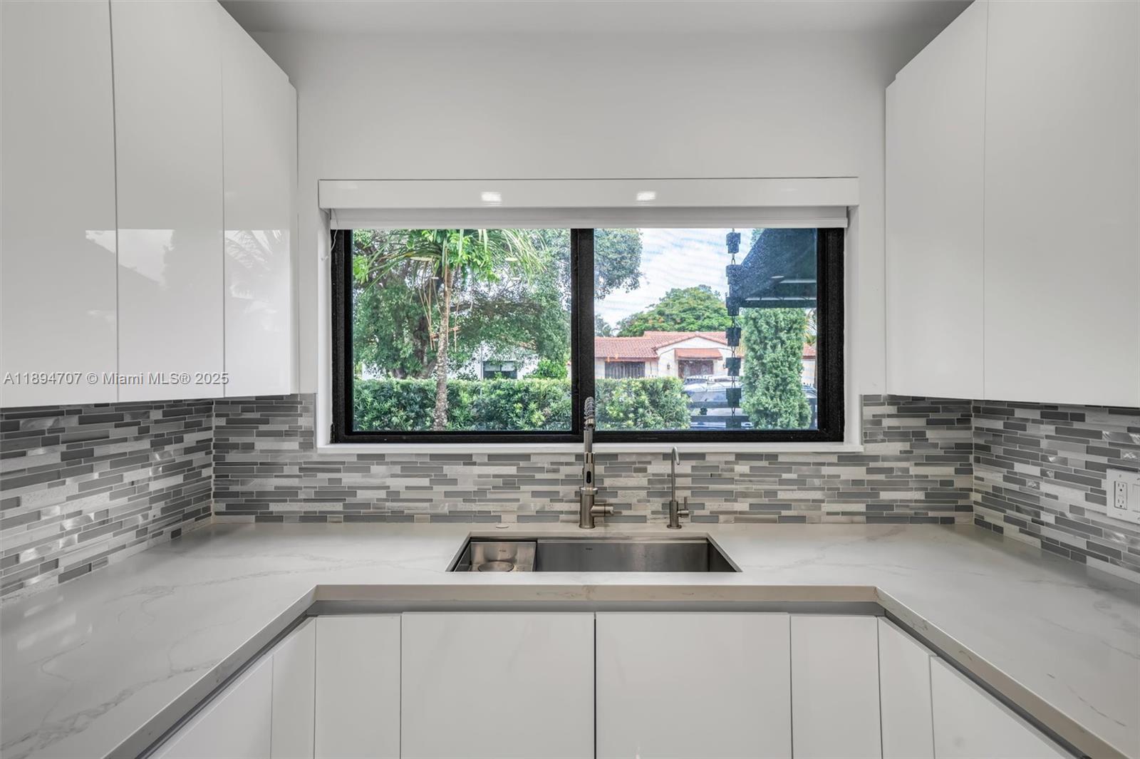 2484 Southwest 25th Street Miami, FL 33133 - Photo 27 of 53 a sink with a window