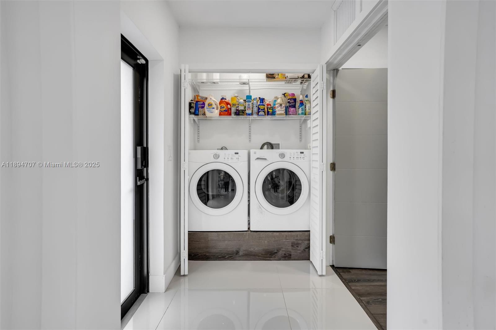 2484 Southwest 25th Street Miami, FL 33133 - Photo 35 of 53 a utility room with dryer and washer