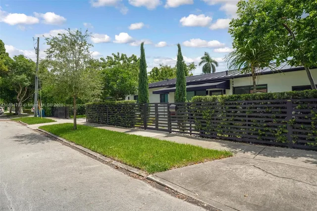 a view of a backyard with a garden