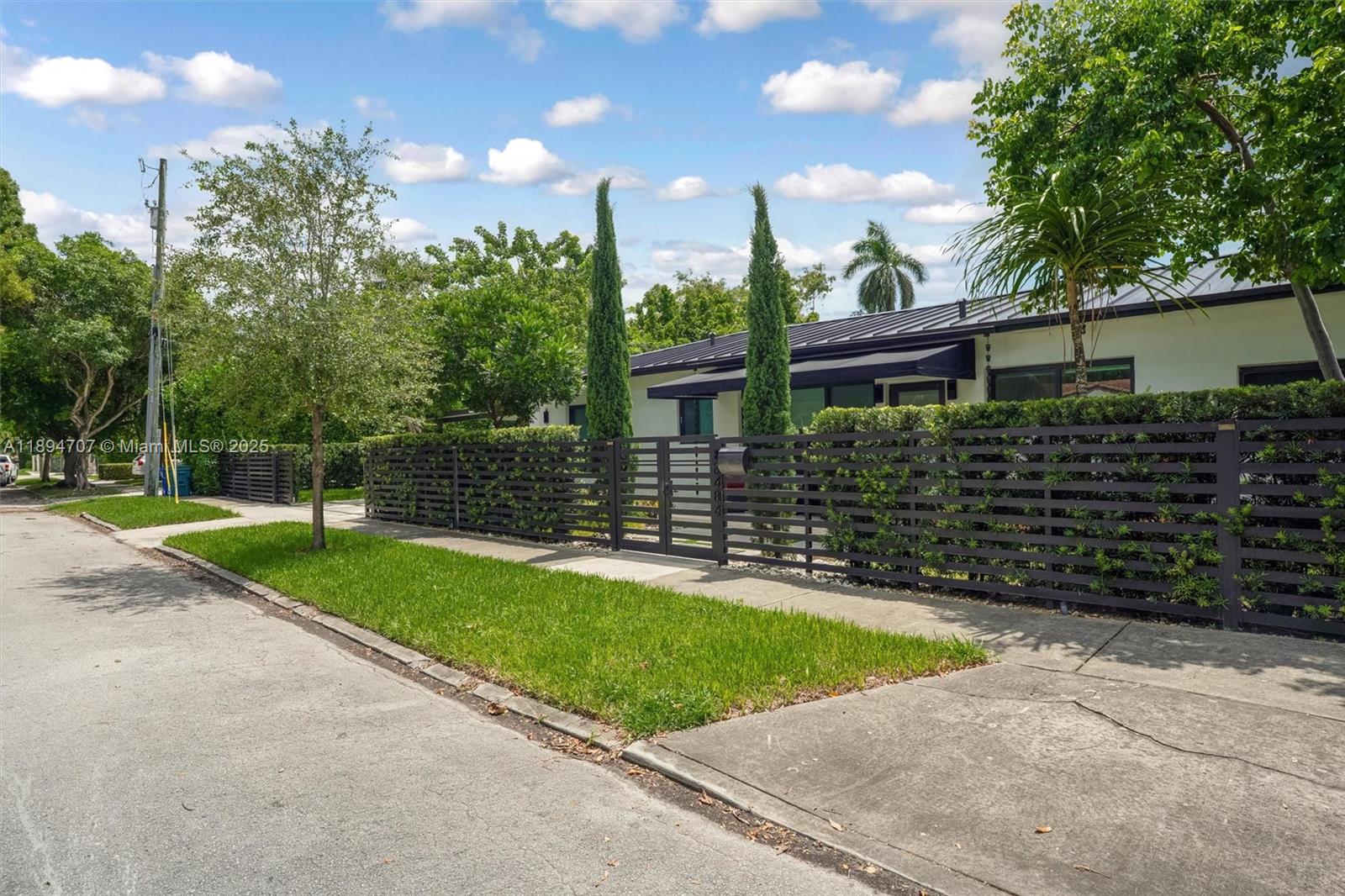 2484 Southwest 25th Street Miami, FL 33133 - Photo 4 of 53 a view of a backyard with a garden