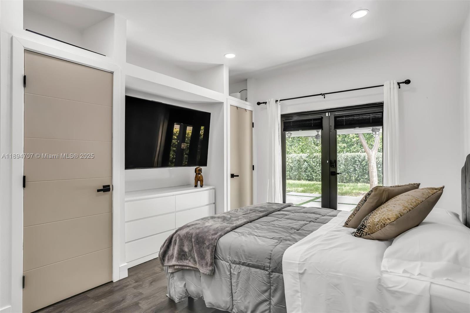 2484 Southwest 25th Street Miami, FL 33133 - Photo 45 of 53 a bedroom with a bed and a window