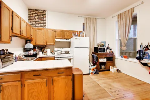 $1,295,000 | 1639 North Claremont Avenue, Chicago, IL 60647