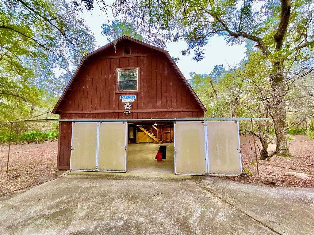 141 Tucker Lake Road Melrose, FL 32666 - Photo 20 of 29 a view of outdoor space yard and garage