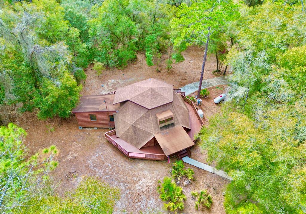 141 Tucker Lake Road Melrose, FL 32666 - Photo 23 of 29 an aerial view of a house with garden space and street view