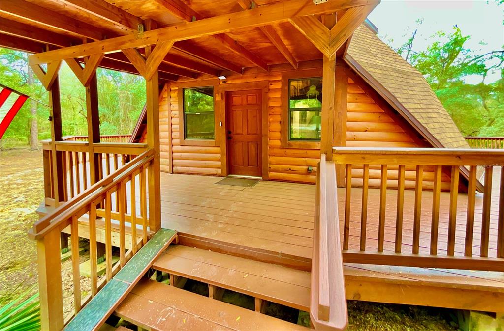 141 Tucker Lake Road Melrose, FL 32666 - Photo 25 of 29 a view of wooden balcony