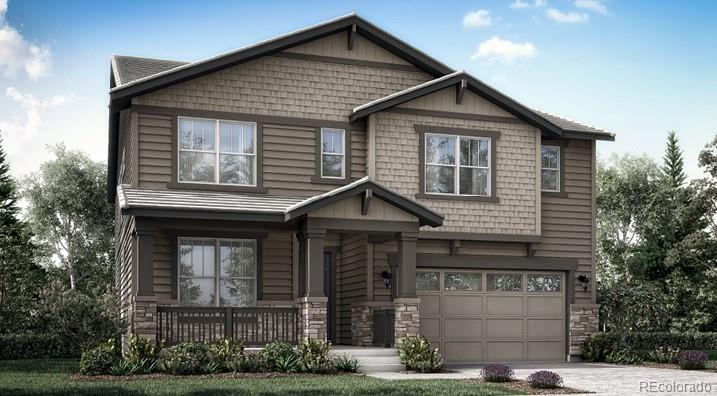 a front view of a house with garage