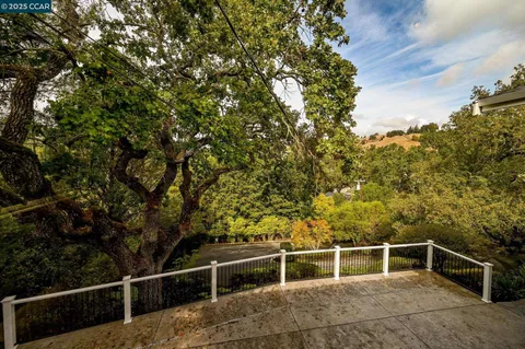 a room with furniture and a large window