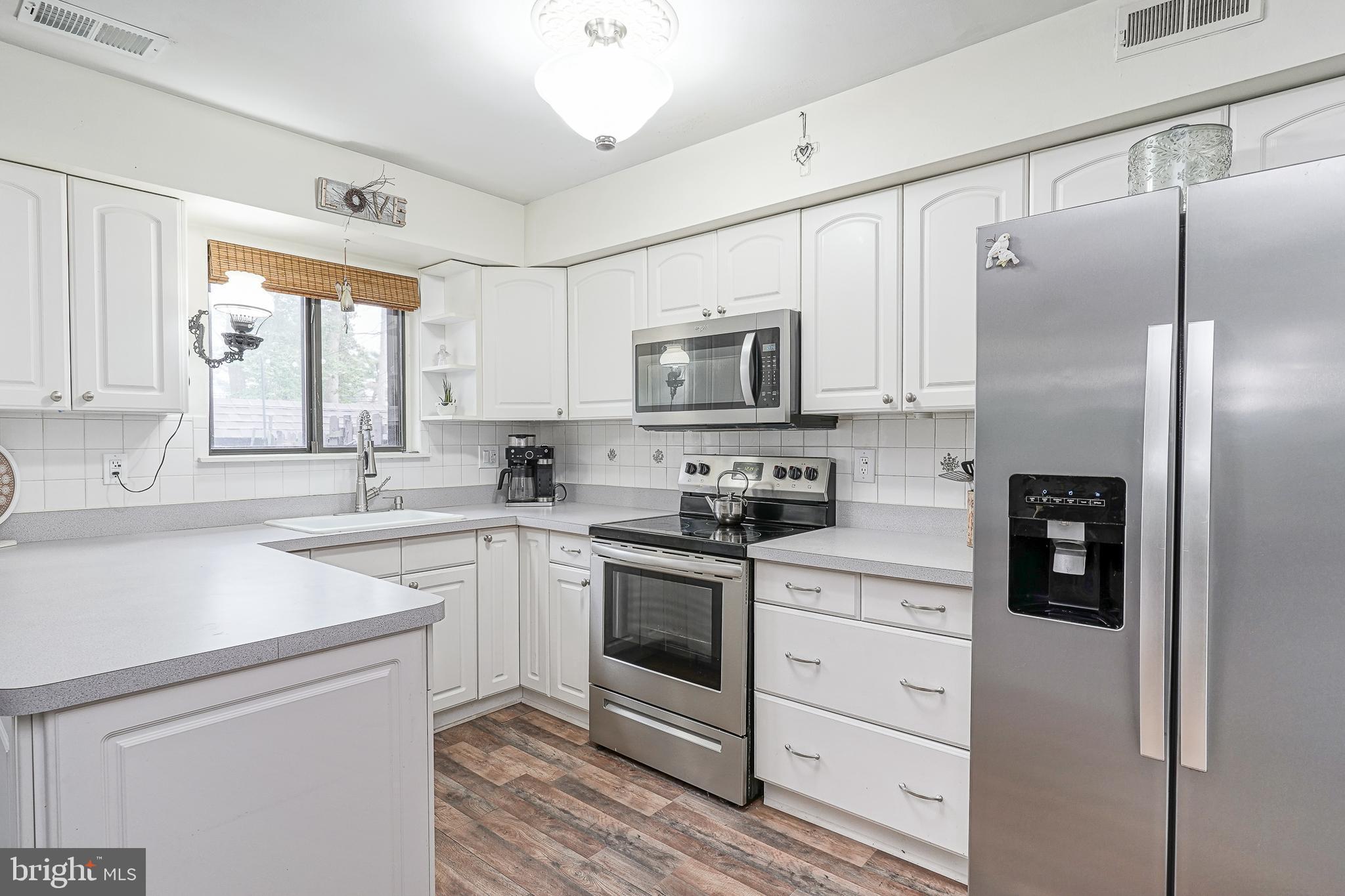 8 Sycamore Court Lumberton, NJ 08048 - Photo 12 of 26 a kitchen with cabinets stainless steel appliances and window