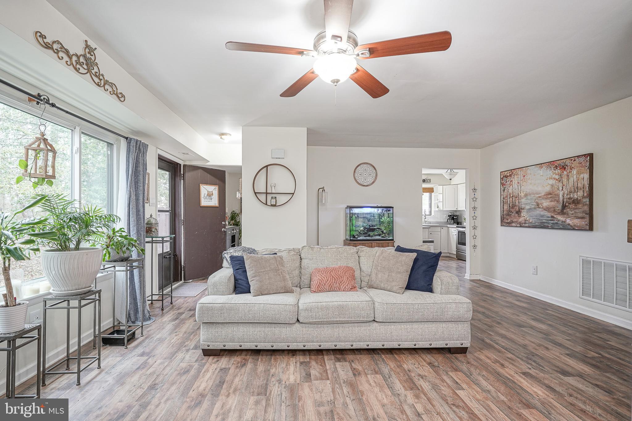8 Sycamore Court Lumberton, NJ 08048 - Photo 2 of 26 a living room with furniture and a large window