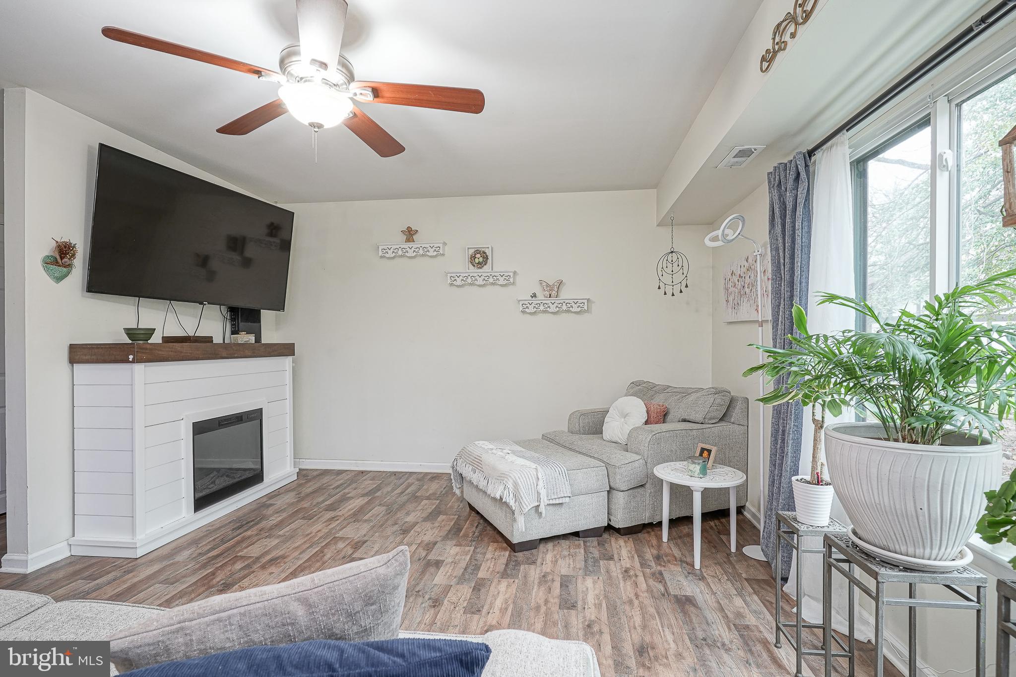 8 Sycamore Court Lumberton, NJ 08048 - Photo 5 of 26 Charming Shiplap Electric Fireplace w/ Wood Mantle