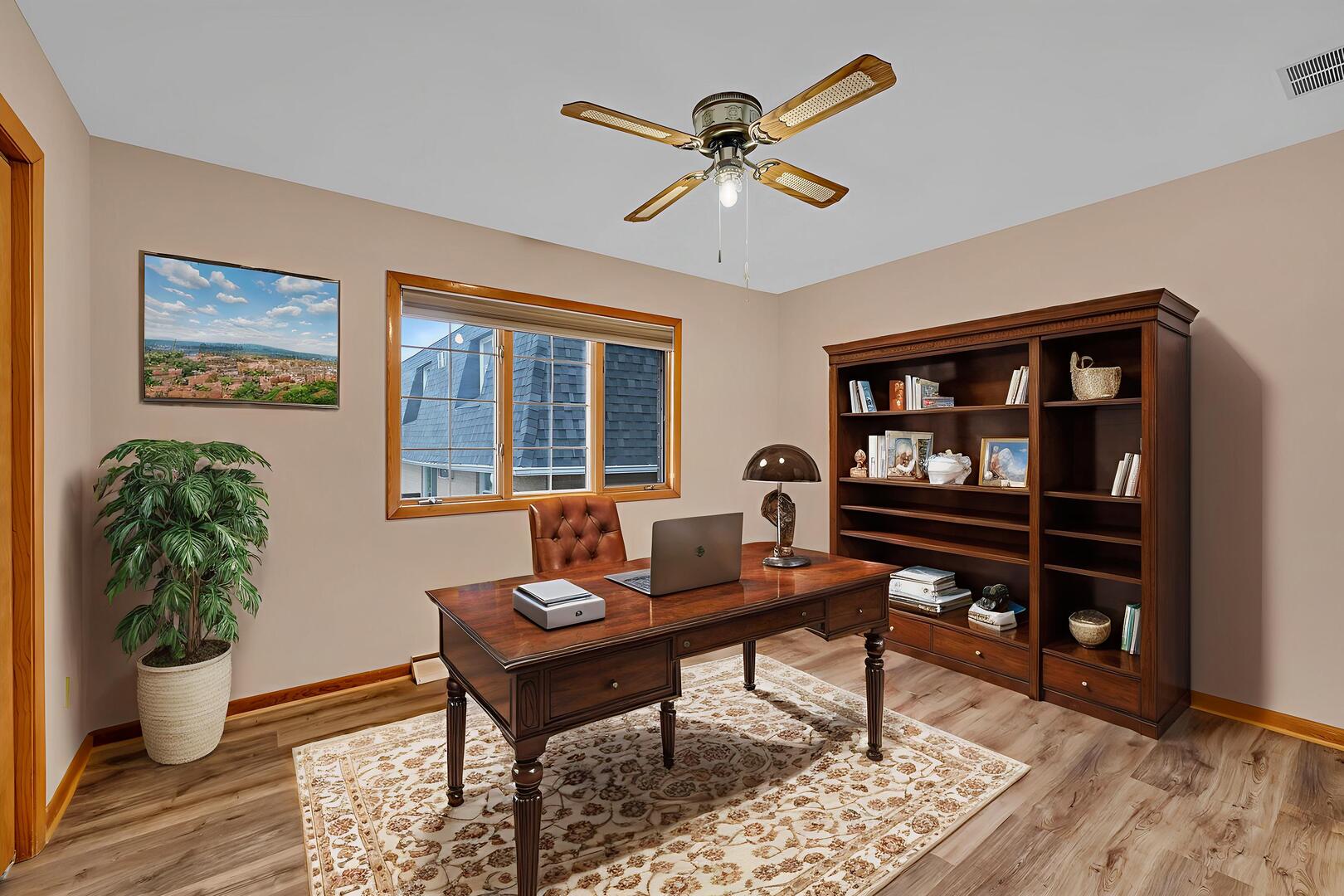 613 East 3rd Street, Unit 4 Lockport, IL 60441 - Photo 12 of 25 a living room with furniture and a window