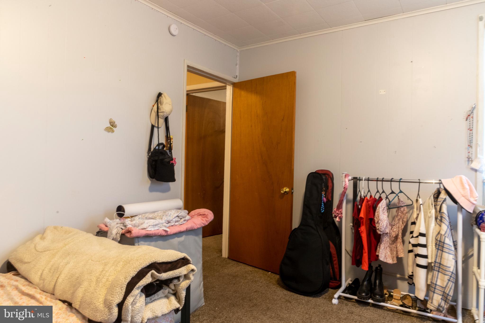 260 South 6th Street Lebanon, PA 17042 - Photo 13 of 21 a bedroom with a bed and a mirror