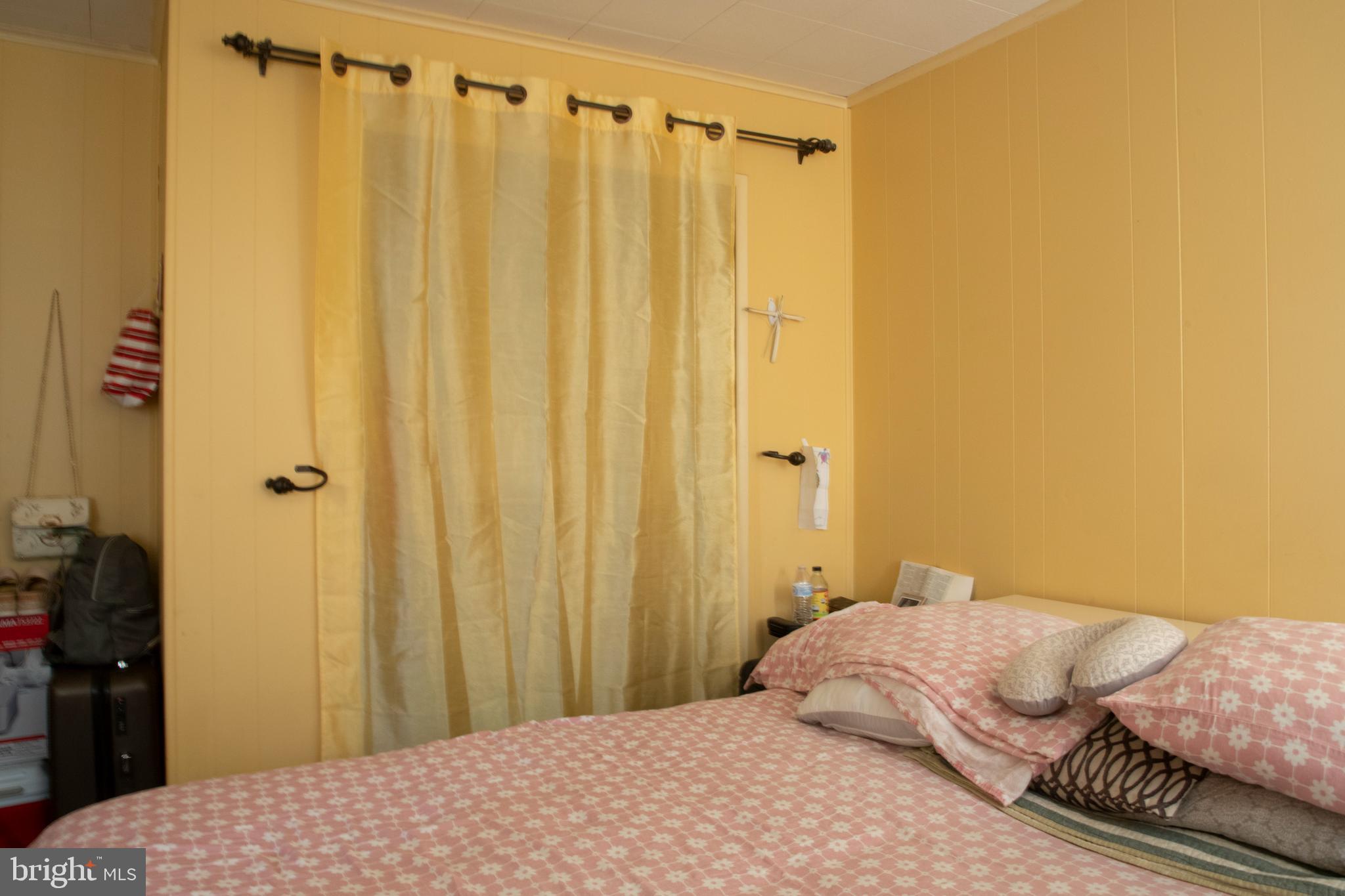 260 South 6th Street Lebanon, PA 17042 - Photo 15 of 21 a bedroom with a bed and a curtain