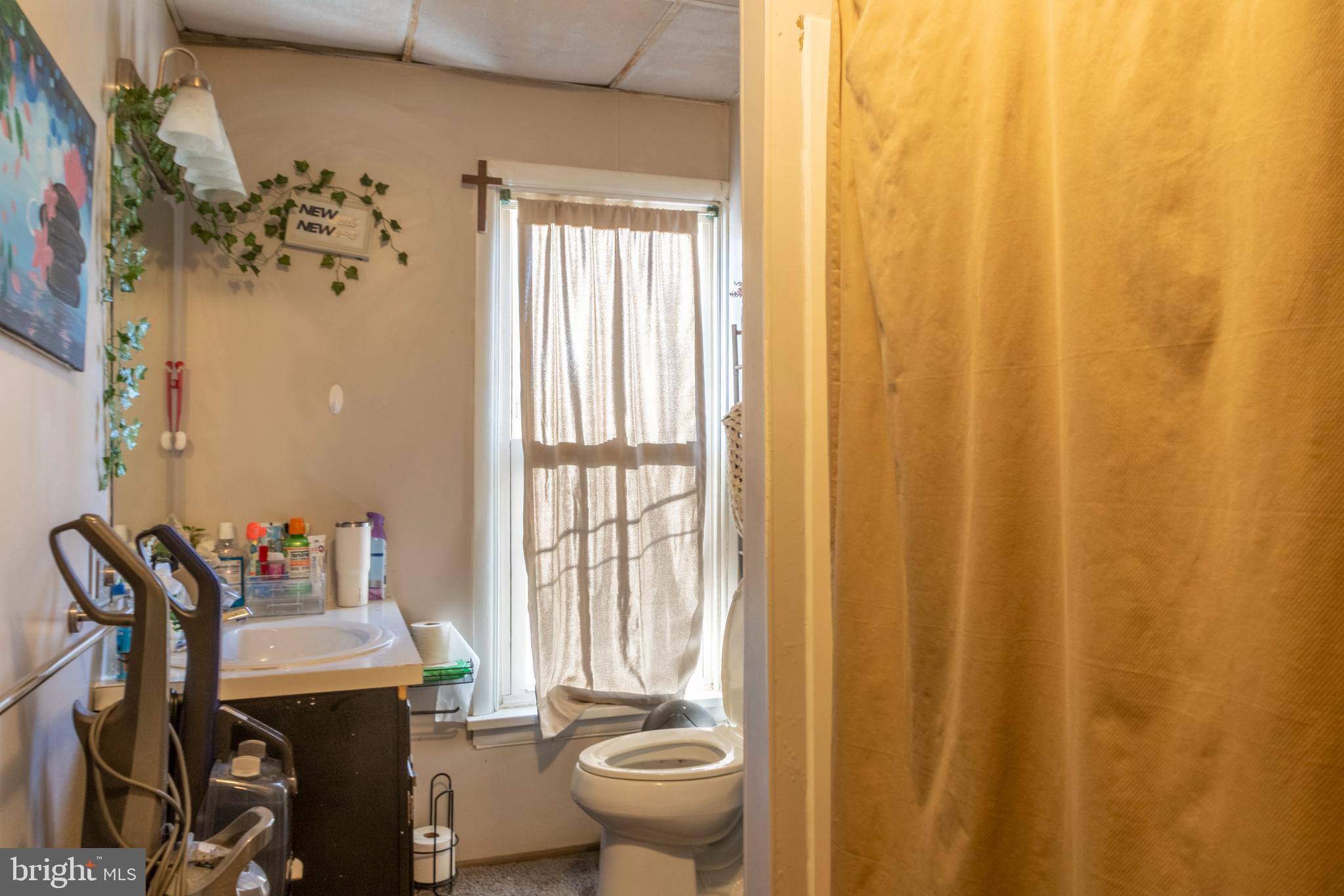 260 South 6th Street Lebanon, PA 17042 - Photo 16 of 21 a bathroom with a sink and a toilet