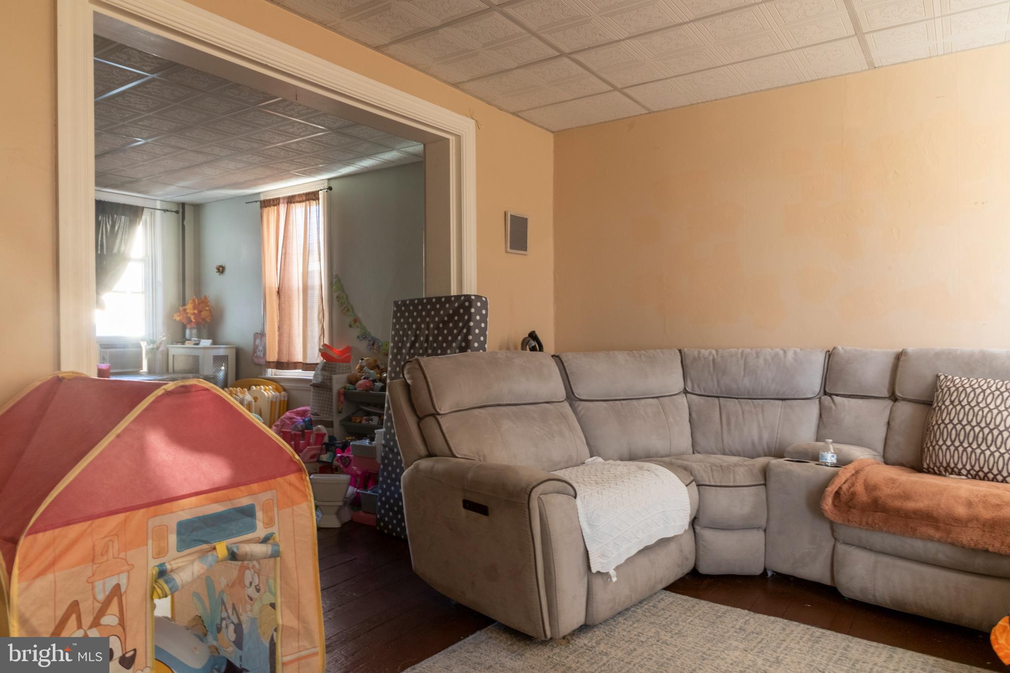 260 South 6th Street Lebanon, PA 17042 - Photo 2 of 21 a living room with furniture and a couch