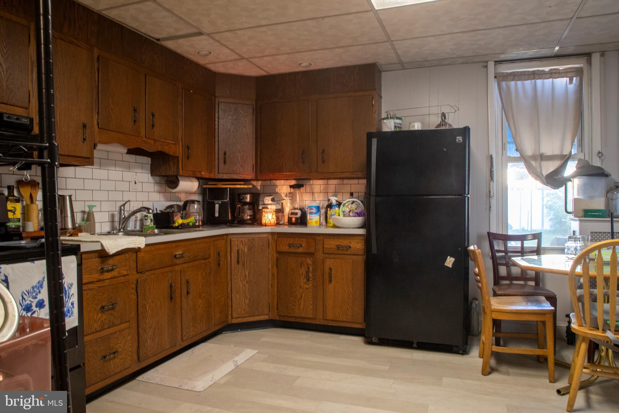 260 South 6th Street Lebanon, PA 17042 - Photo 6 of 21 a kitchen with a refrigerator and cabinets