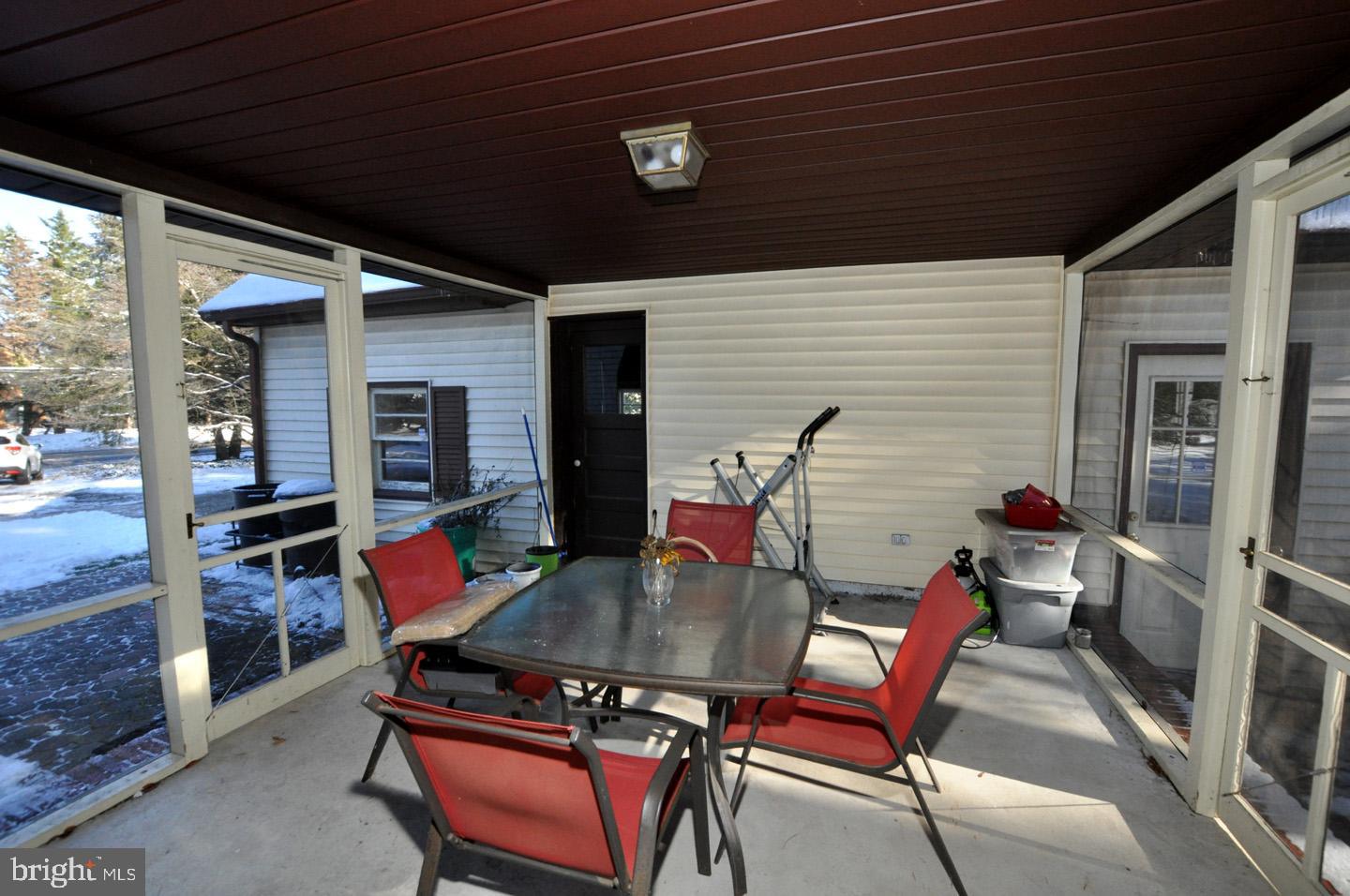 4312 Church Road Mount Laurel, NJ 08054 - Photo 19 of 21 Screened porch between house and garage.