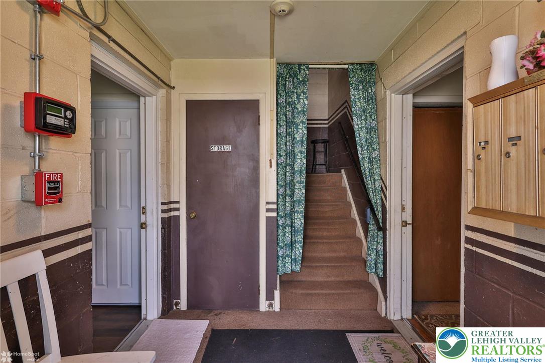 802 West Berwick Street Easton, PA 18042 - Photo 3 of 54 a view of a hallway with wooden floor and staircase