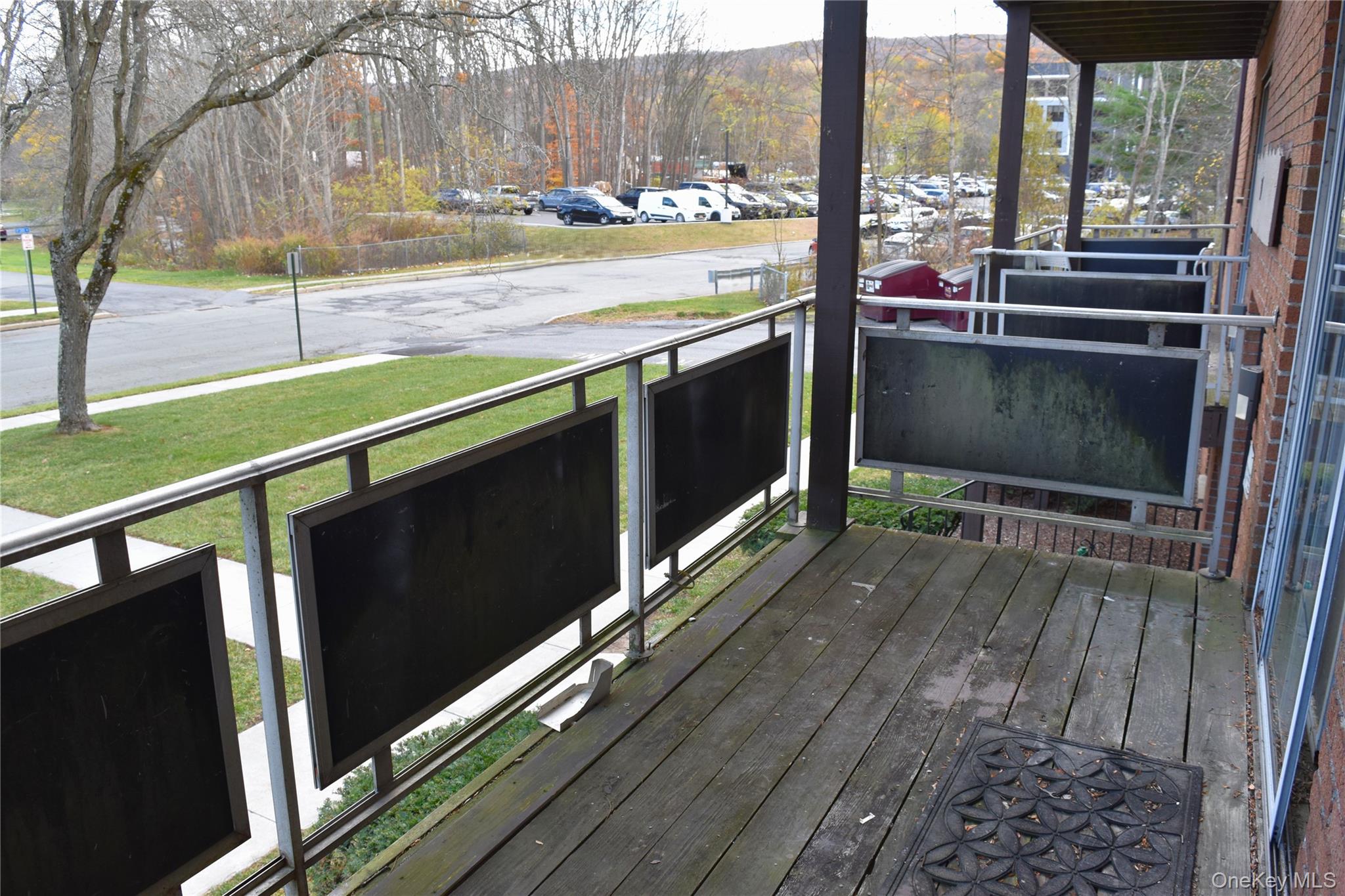 37 Tanager Road, Unit 3704 Monroe, NY 10950 - Photo 18 of 25 a living room with a floor to ceiling window and wooden floor
