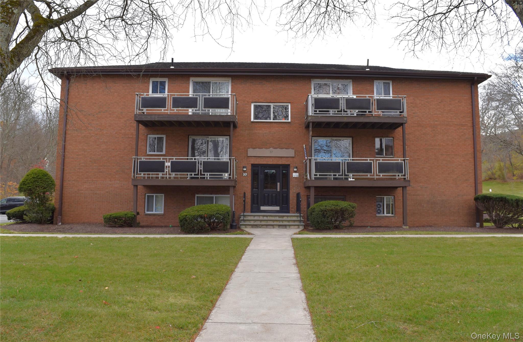 37 Tanager Road, Unit 3704 Monroe, NY 10950 - Photo 2 of 25 a front view of a house with a yard