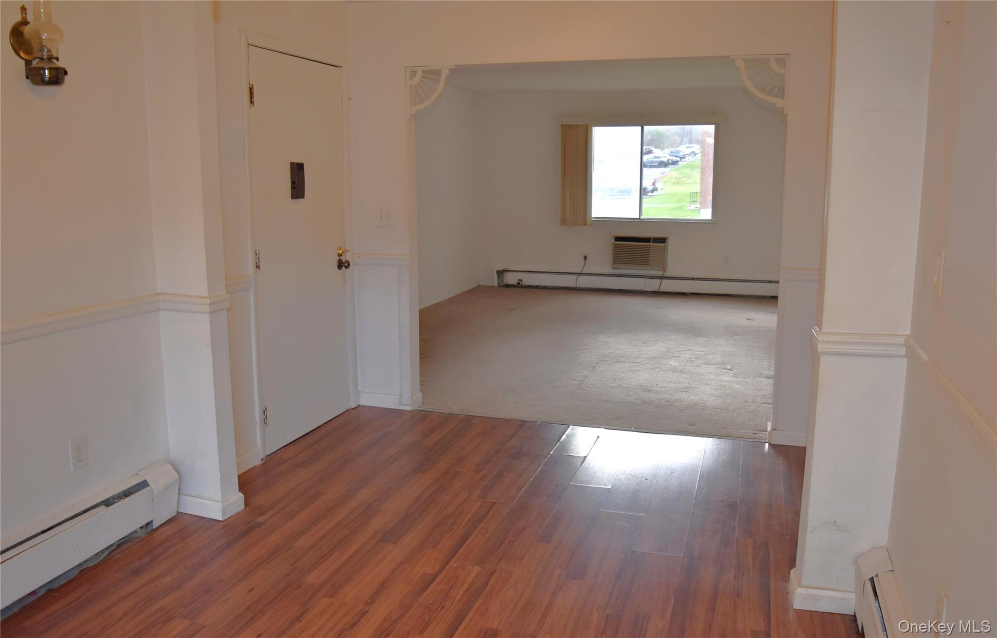 37 Tanager Road, Unit 3704 Monroe, NY 10950 - Photo 7 of 25 a view of a hallway with wooden floor