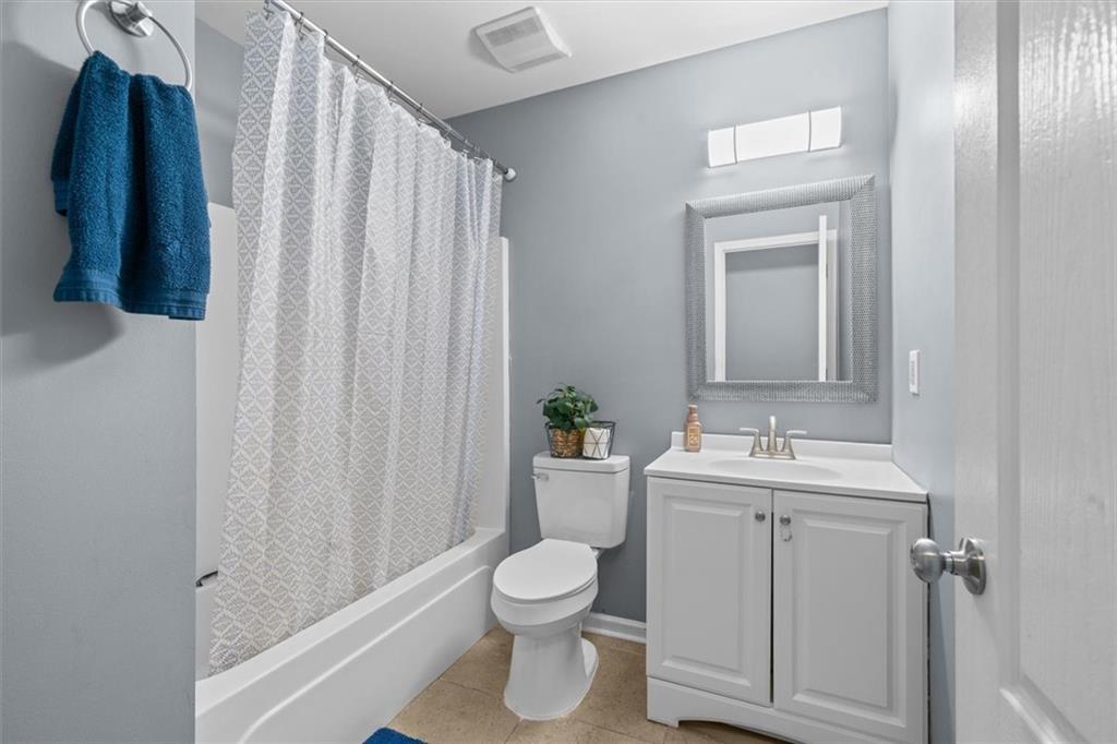 171 Bear Den Court Dalton, GA 30721 - Photo 18 of 30 a bathroom with a toilet a sink and a mirror