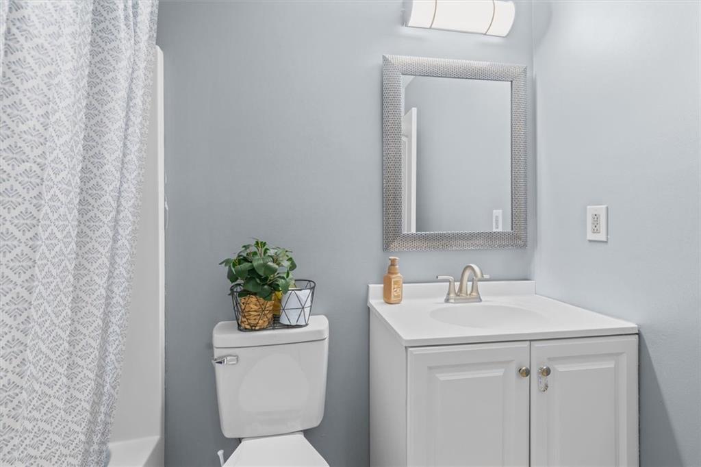 171 Bear Den Court Dalton, GA 30721 - Photo 19 of 30 a bathroom with a sink a toilet and a mirror