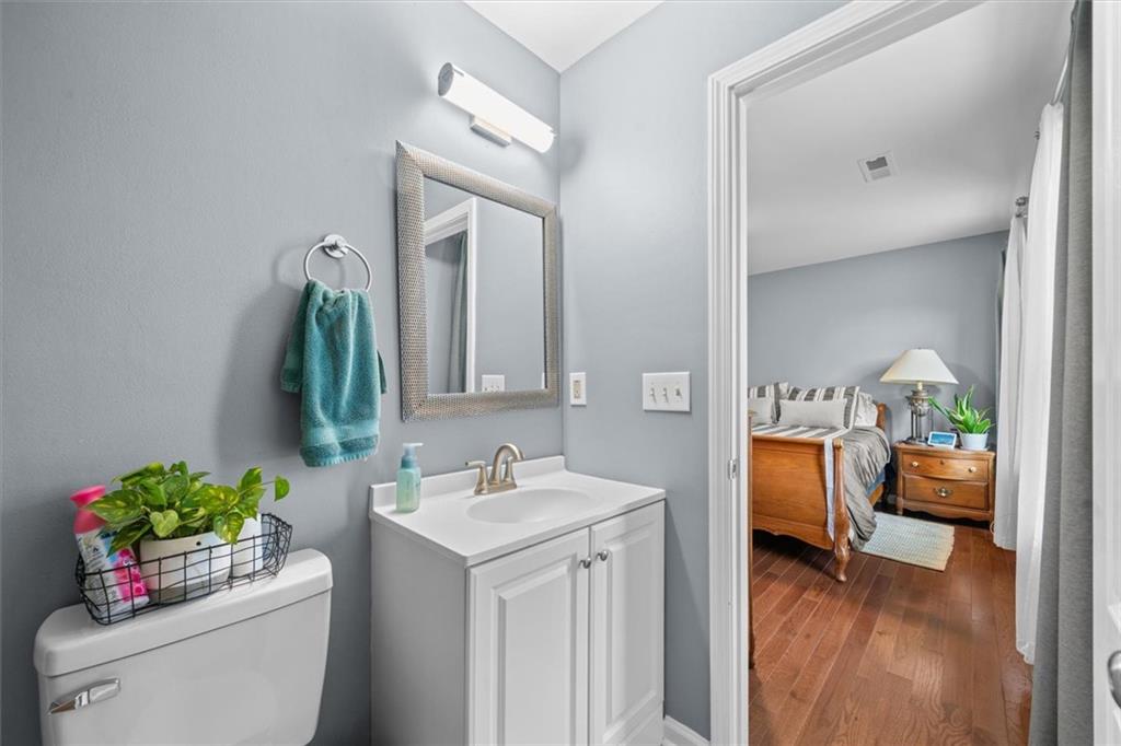 171 Bear Den Court Dalton, GA 30721 - Photo 25 of 30 a en suite bathroom with a toilet sink and mirror