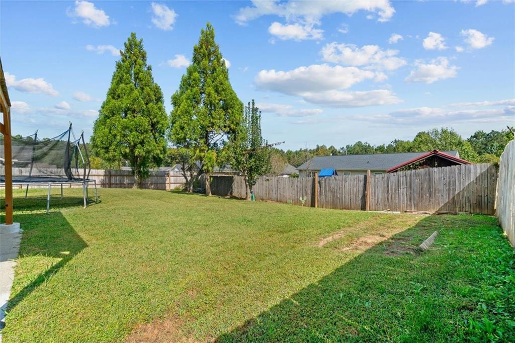 171 Bear Den Court Dalton, GA 30721 - Photo 27 of 30 a view of a yard with a fountain