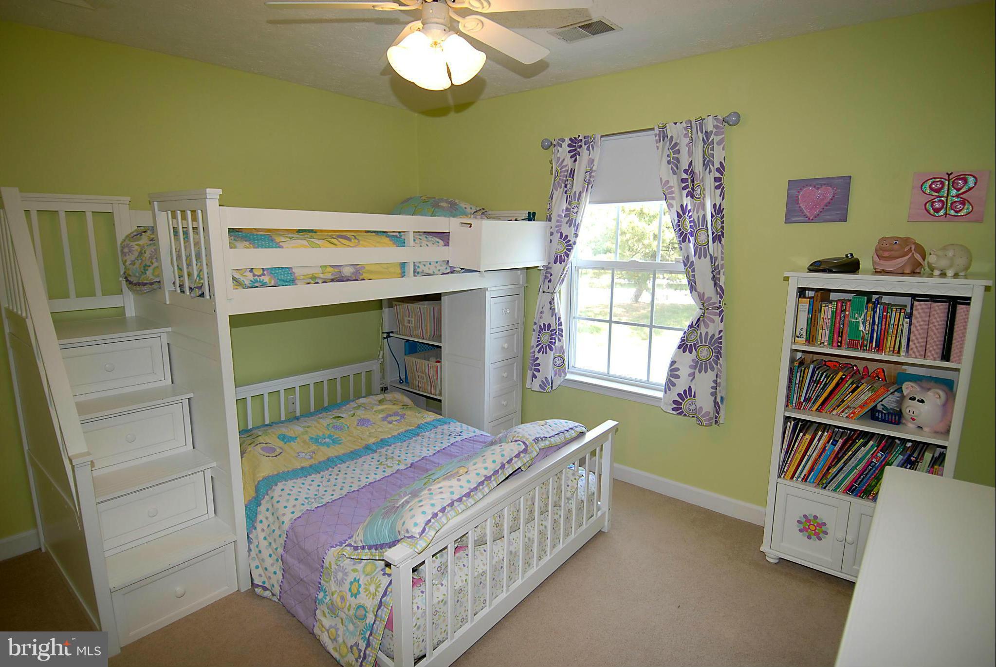 1200 Breckenridge Court Riva, MD 21140 - Photo 15 of 28 a bedroom with a bed and a book shelf