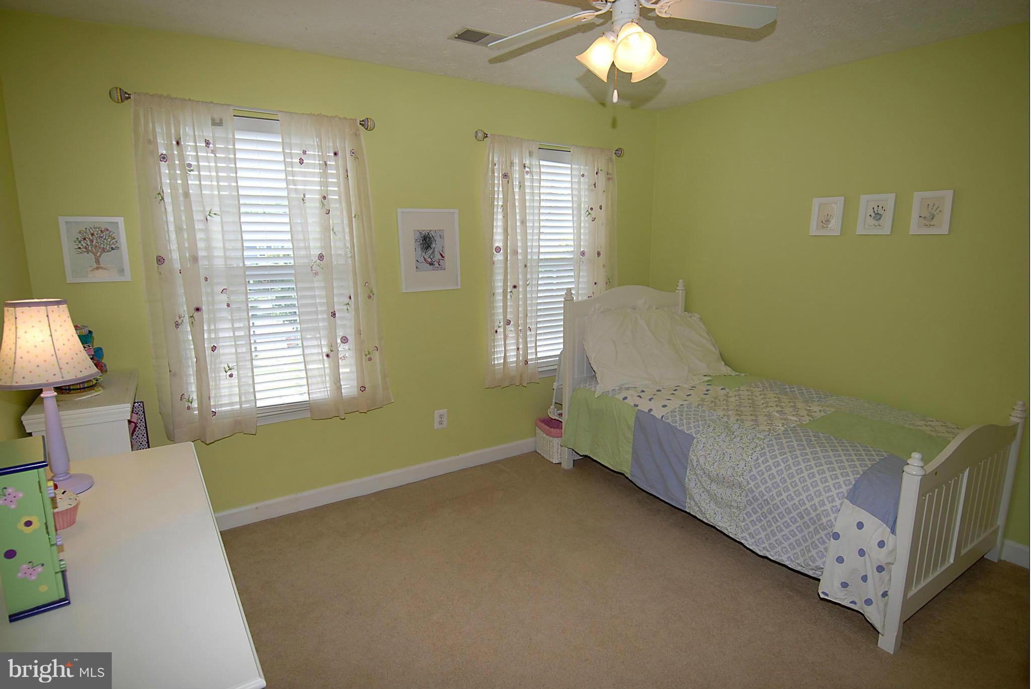 1200 Breckenridge Court Riva, MD 21140 - Photo 16 of 28 a room with windows and a chandelier