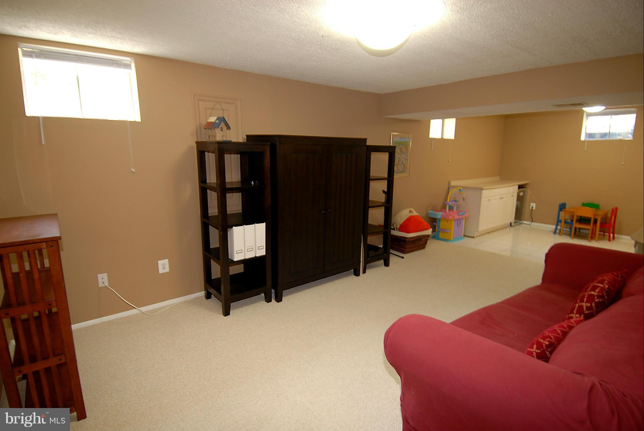1200 Breckenridge Court Riva, MD 21140 - Photo 20 of 28 a bedroom with a bed and gym equipment