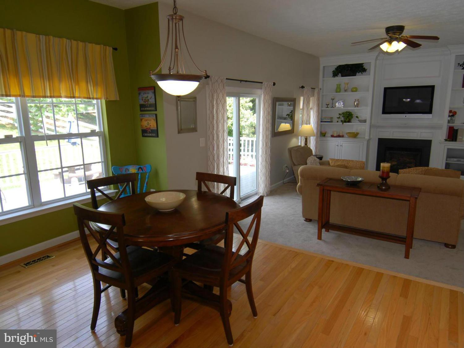 1200 Breckenridge Court Riva, MD 21140 - Photo 7 of 28 a view of a dining room with furniture window and wooden floor