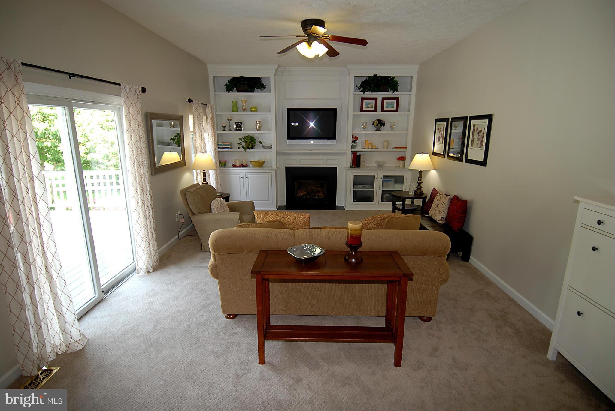 1200 Breckenridge Court Riva, MD 21140 - Photo 9 of 28 a living room with furniture and a fireplace