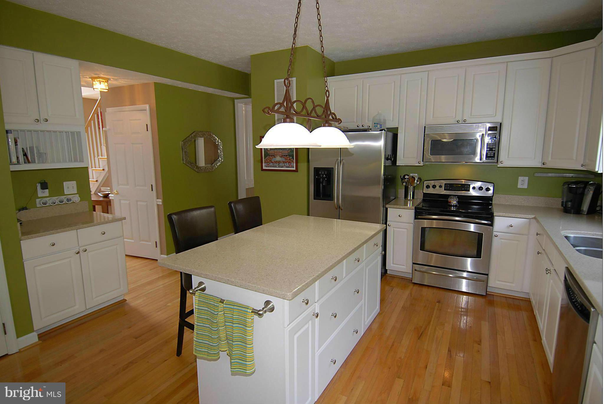1200 Breckenridge Court Riva, MD 21140 - Photo 10 of 28 a kitchen with a stove a refrigerator and a sink