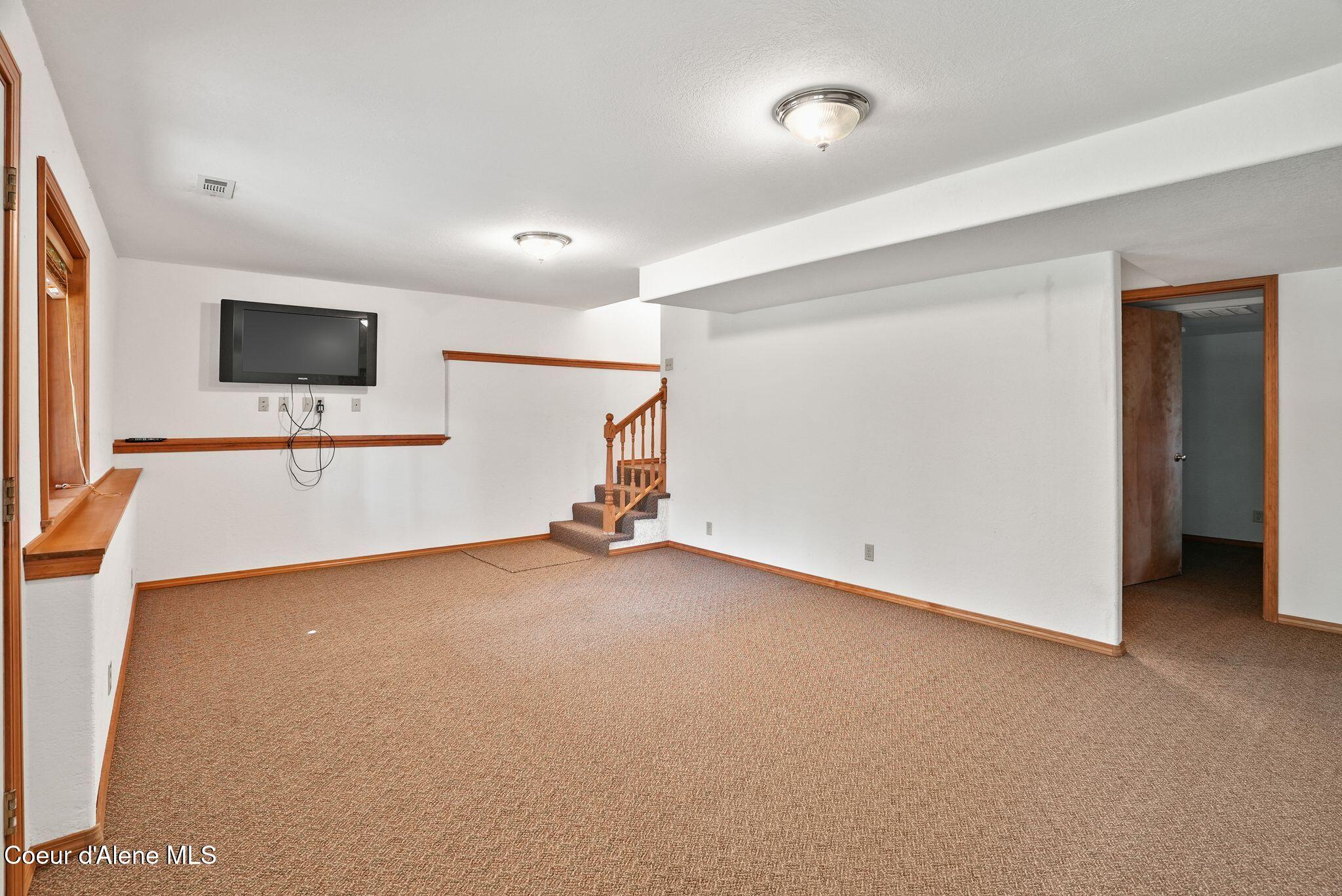 18400 West Holliday Way Hauser, ID 83854 - Photo 21 of 39 Basement great room