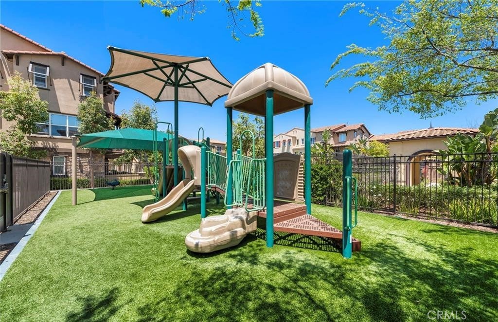 108 Aliso Ridge Loop Mission Viejo, CA 92691 - Photo 3 of 6 a view of a park with slide