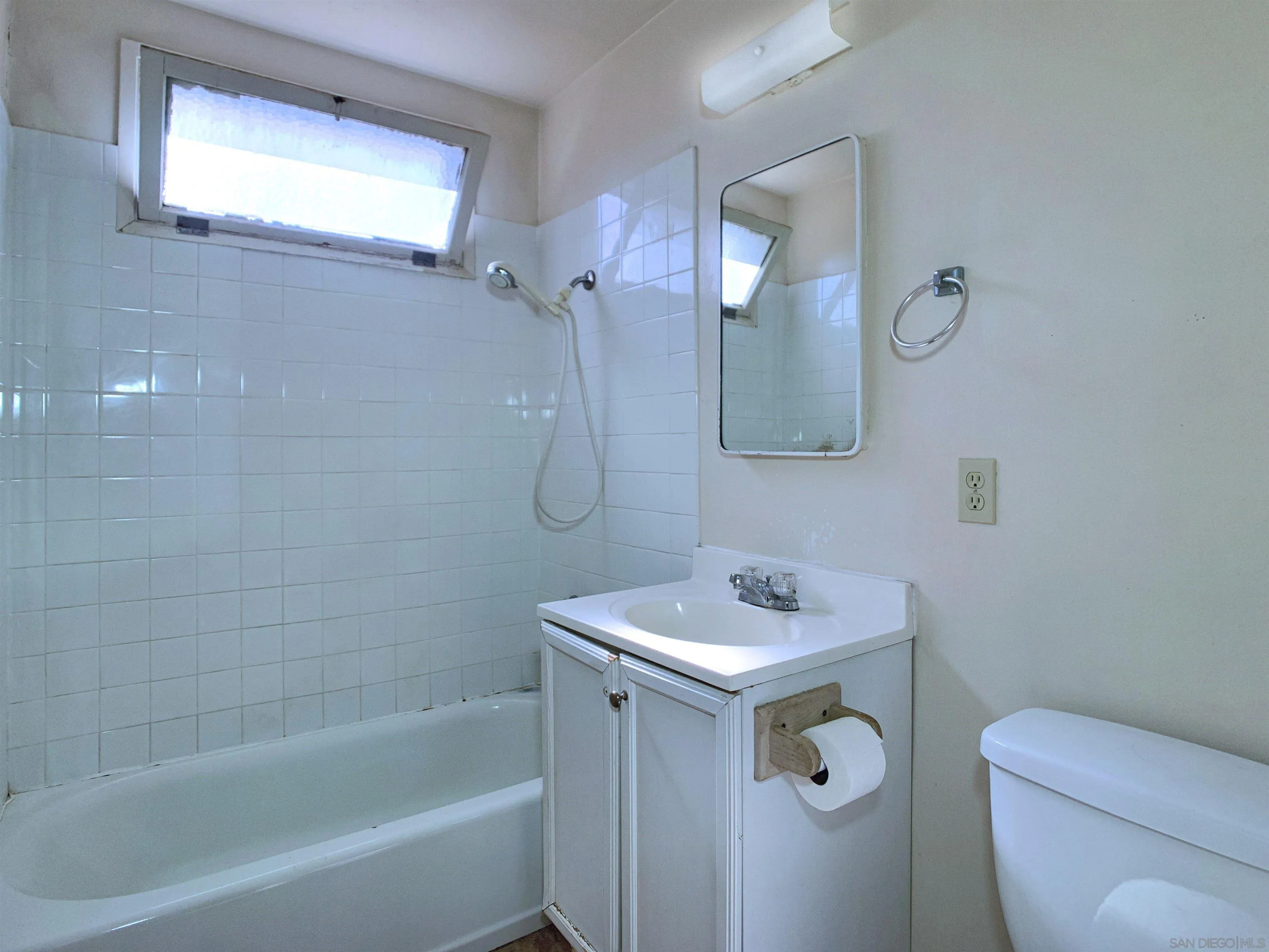 9443 Pebble Beach Drive Santee, CA 92071 - Photo 14 of 16 a bathroom with a sink a toilet and shower