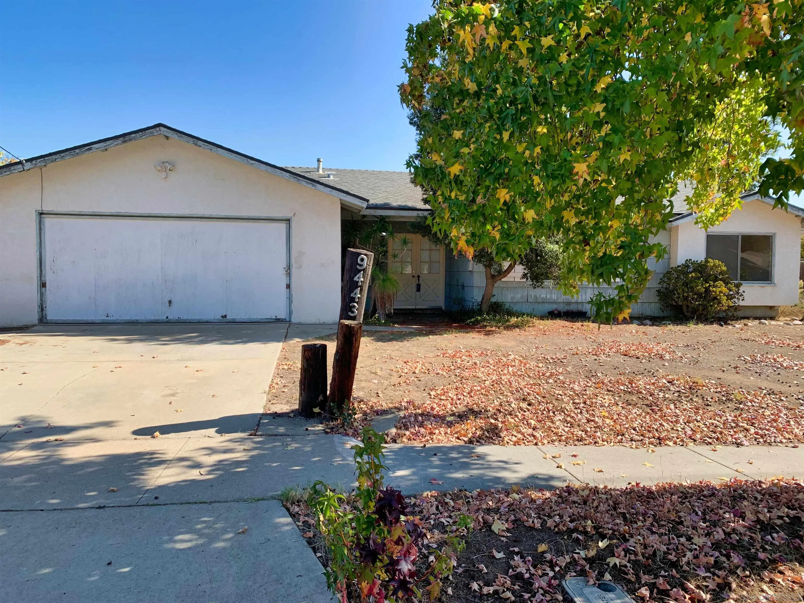 9443 Pebble Beach Drive Santee, CA 92071 - Photo 2 of 16 a view of a backyard of the house