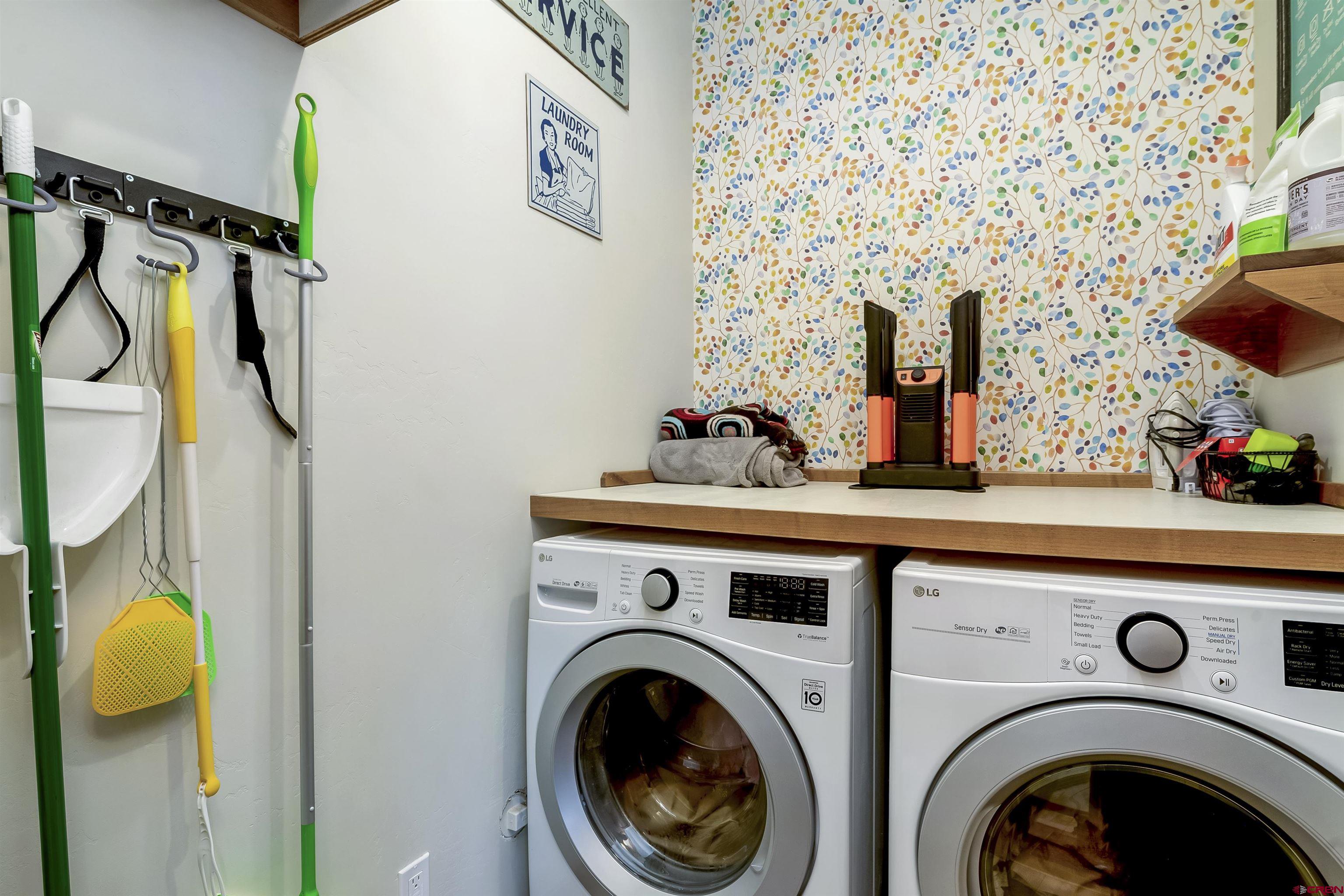 48 Elk Valley Road, Unit B Crested Butte, CO 81224 - Photo 26 of 34 a utility room with dryer and washer