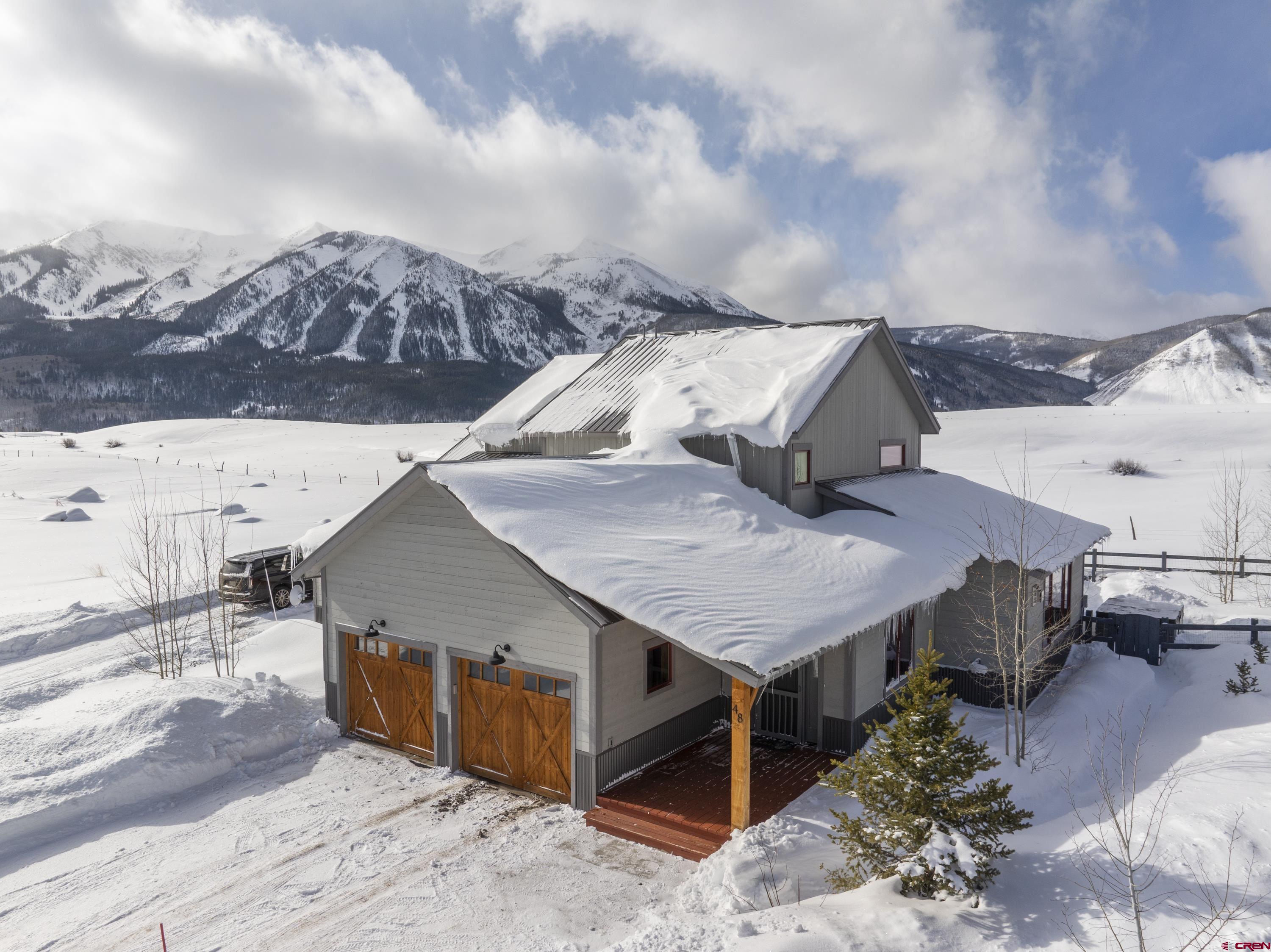 48 Elk Valley Road, Unit B Crested Butte, CO 81224 - Photo 28 of 34 a view of a terrace