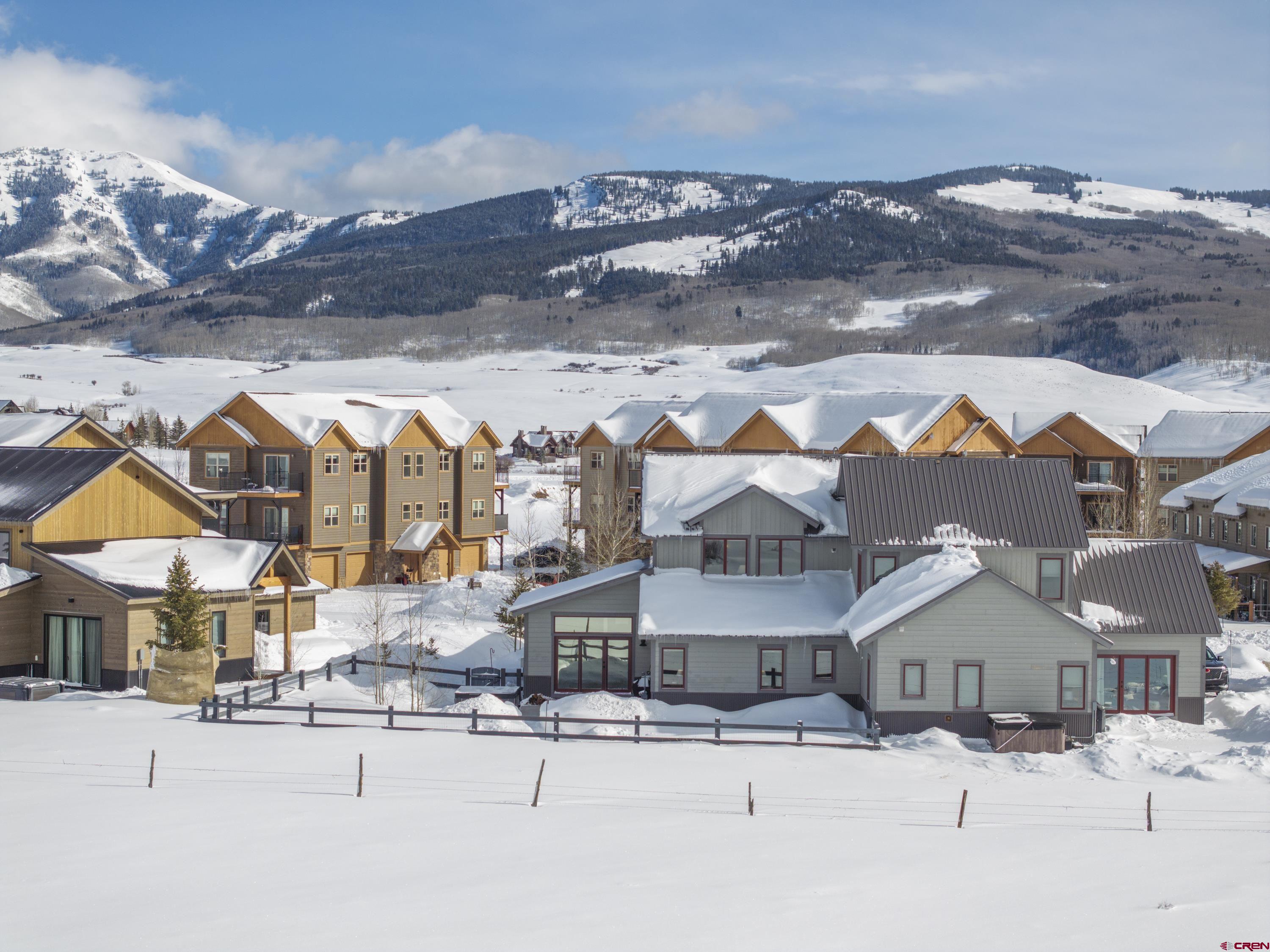 48 Elk Valley Road, Unit B Crested Butte, CO 81224 - Photo 30 of 34 a view of multiple houses with a street