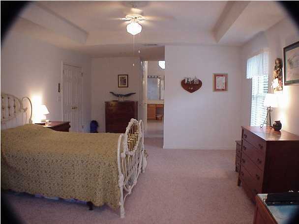 4462 Kingslynn Road Niceville, FL 32578 - Photo 14 of 15 a living room with furniture and windows