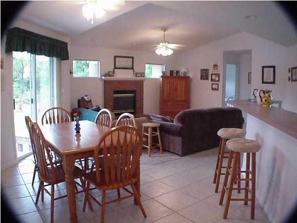 4462 Kingslynn Road Niceville, FL 32578 - Photo 9 of 15 a view of a dining room with furniture window and outside view