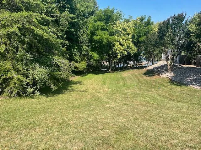 a view of a yard with an outdoor space