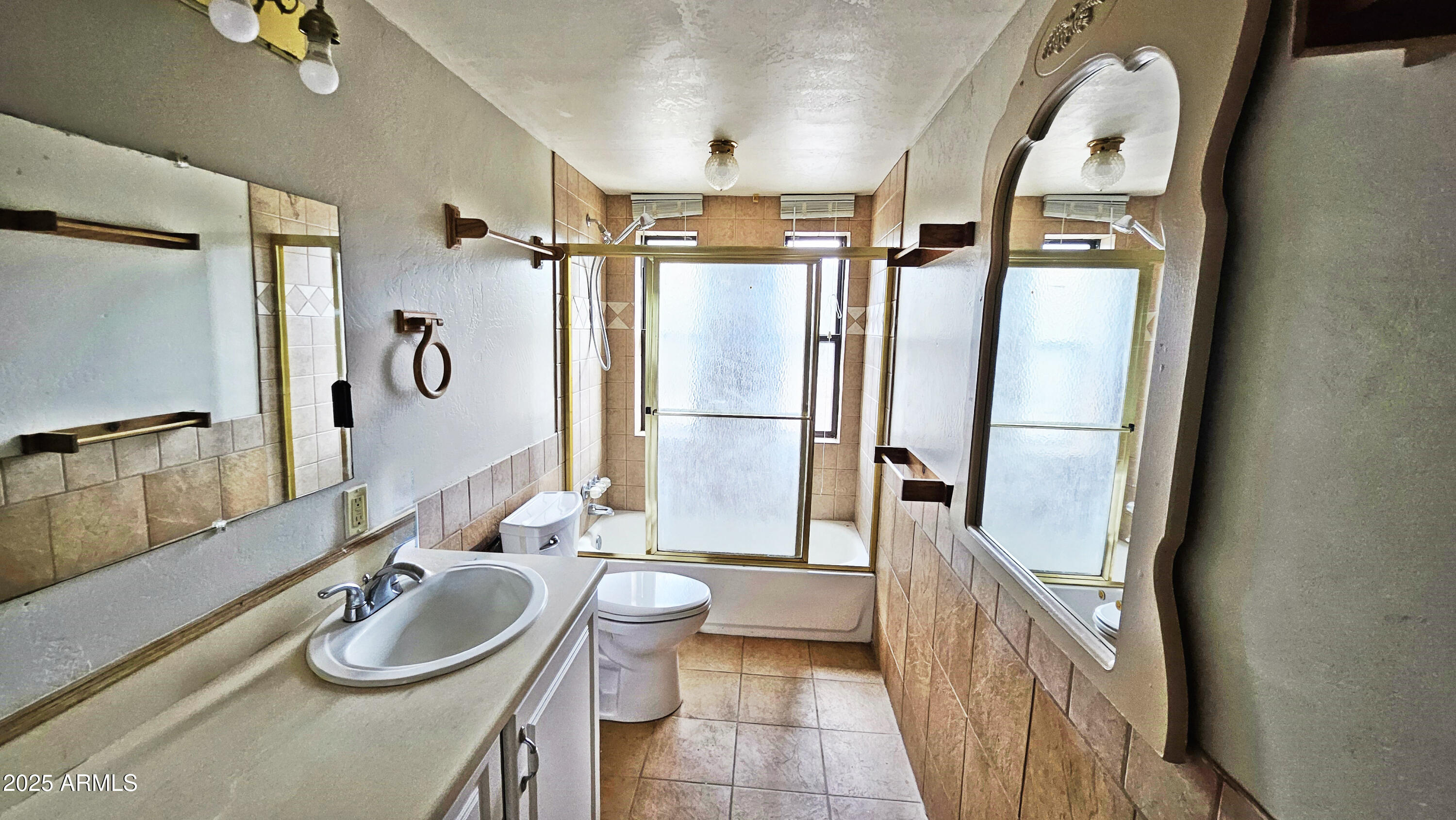 616 Verde Place Payson, AZ 85541 - Photo 16 of 29 a bathroom with a tub sink and mirror